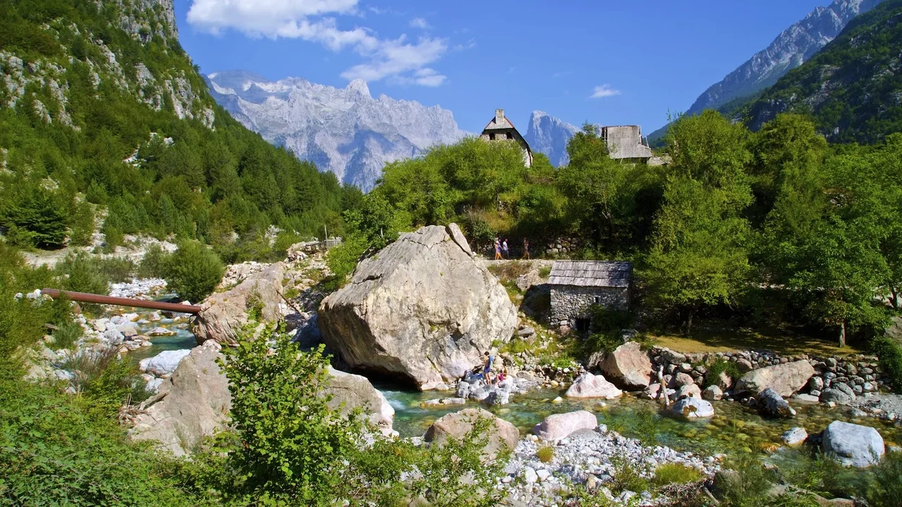 The village of Theth spread across its valley beneath the Albanian Alps